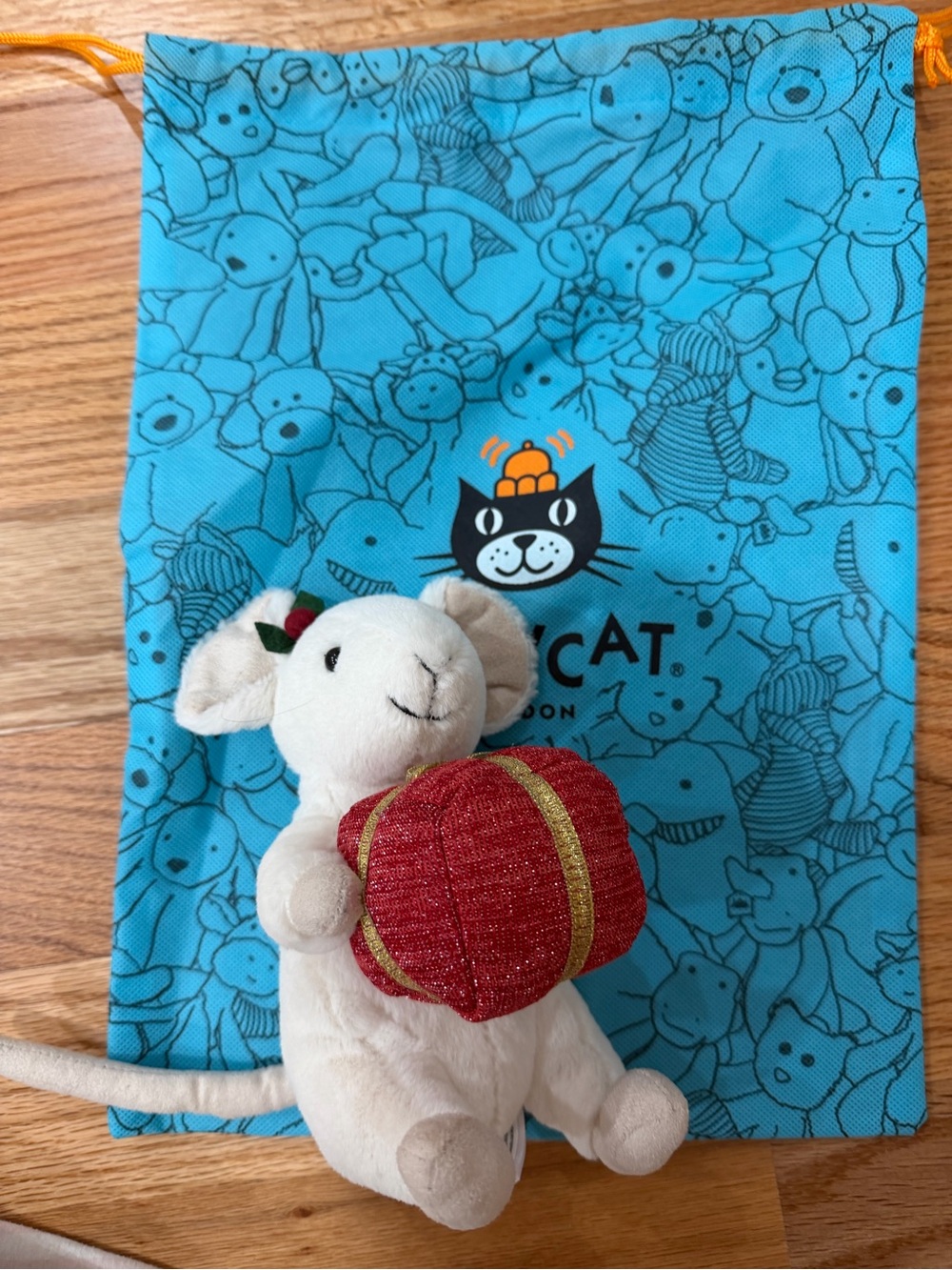 Jellycat Cream Plush with Turquoise Cat-Pattern Pouch